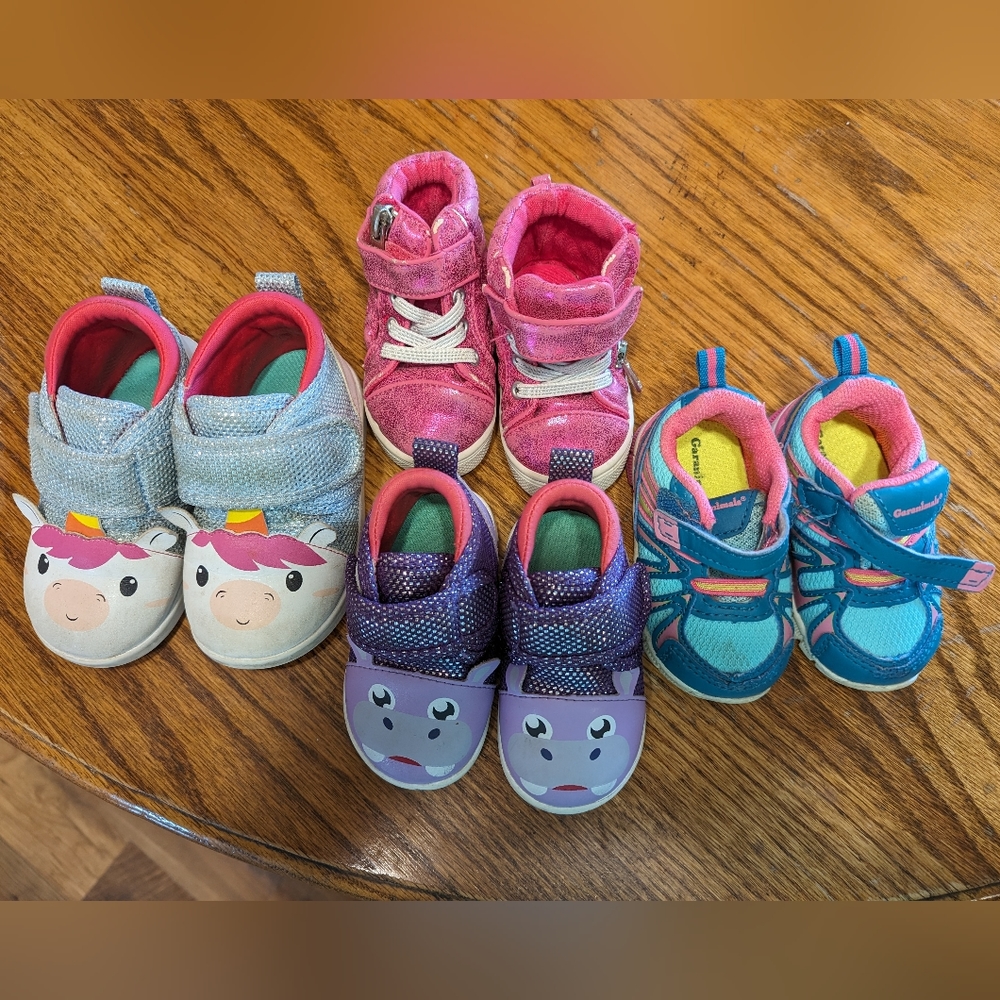 4 pair gently used toddler shoes.